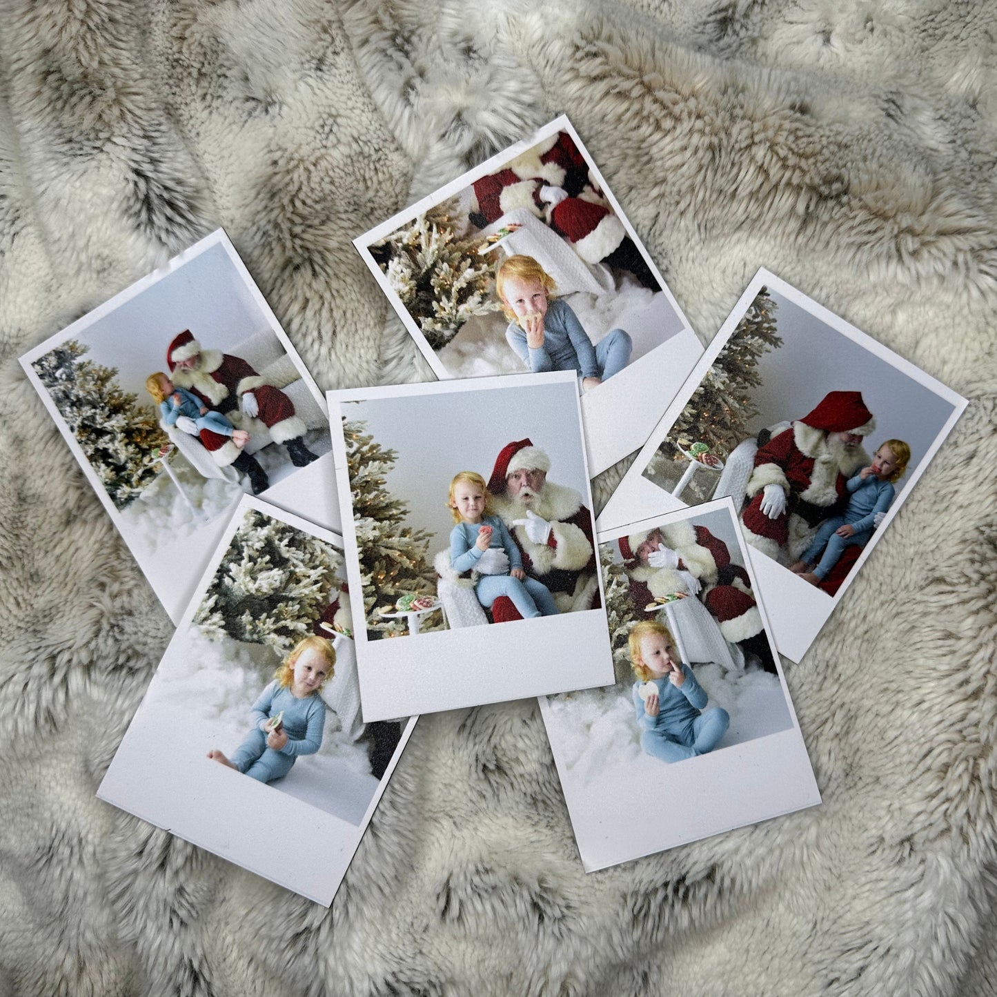 Collection of Polaroid-style Christmas Photo Magnets on a fluffy surface