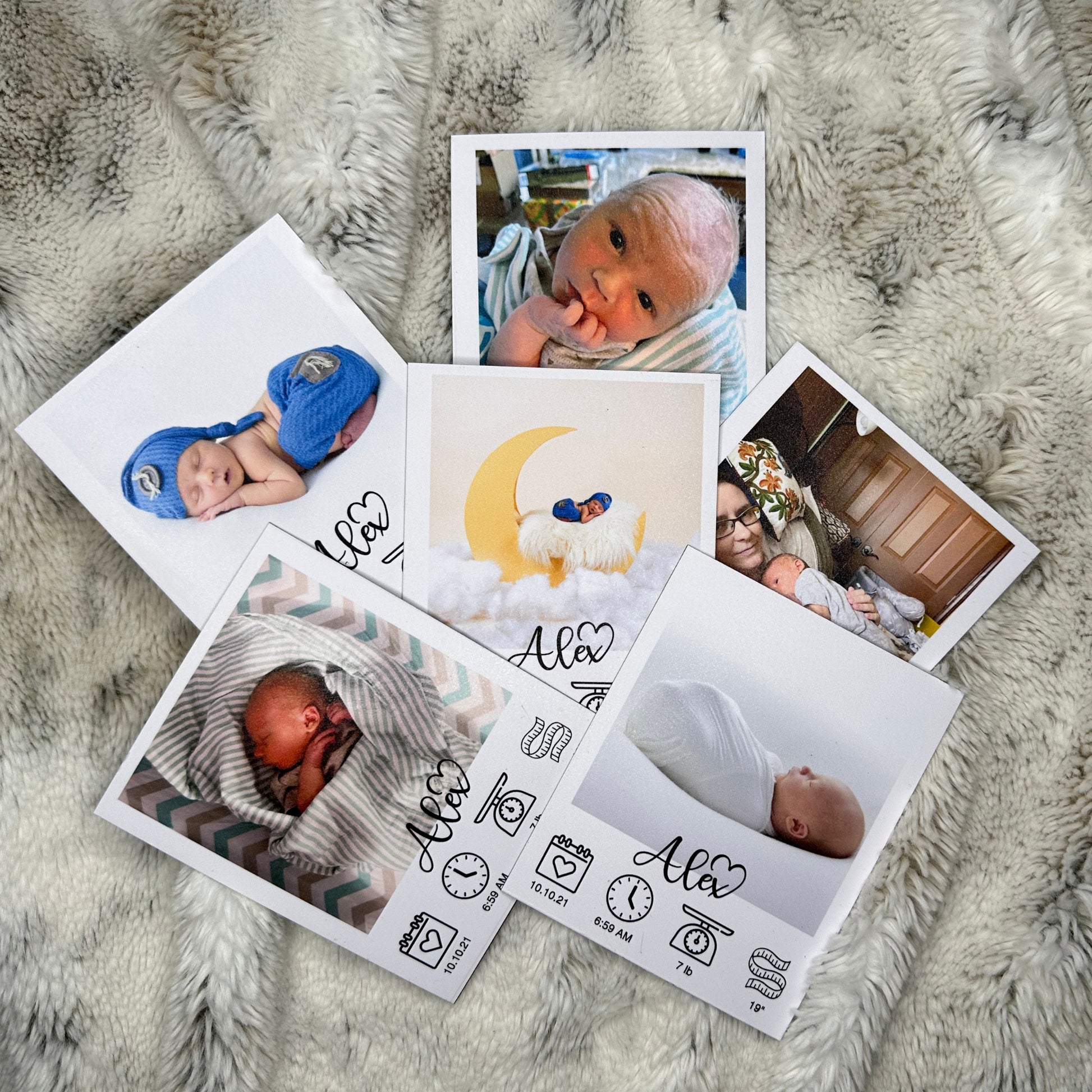 Collection of custom newborn photo magnets on a textured surface