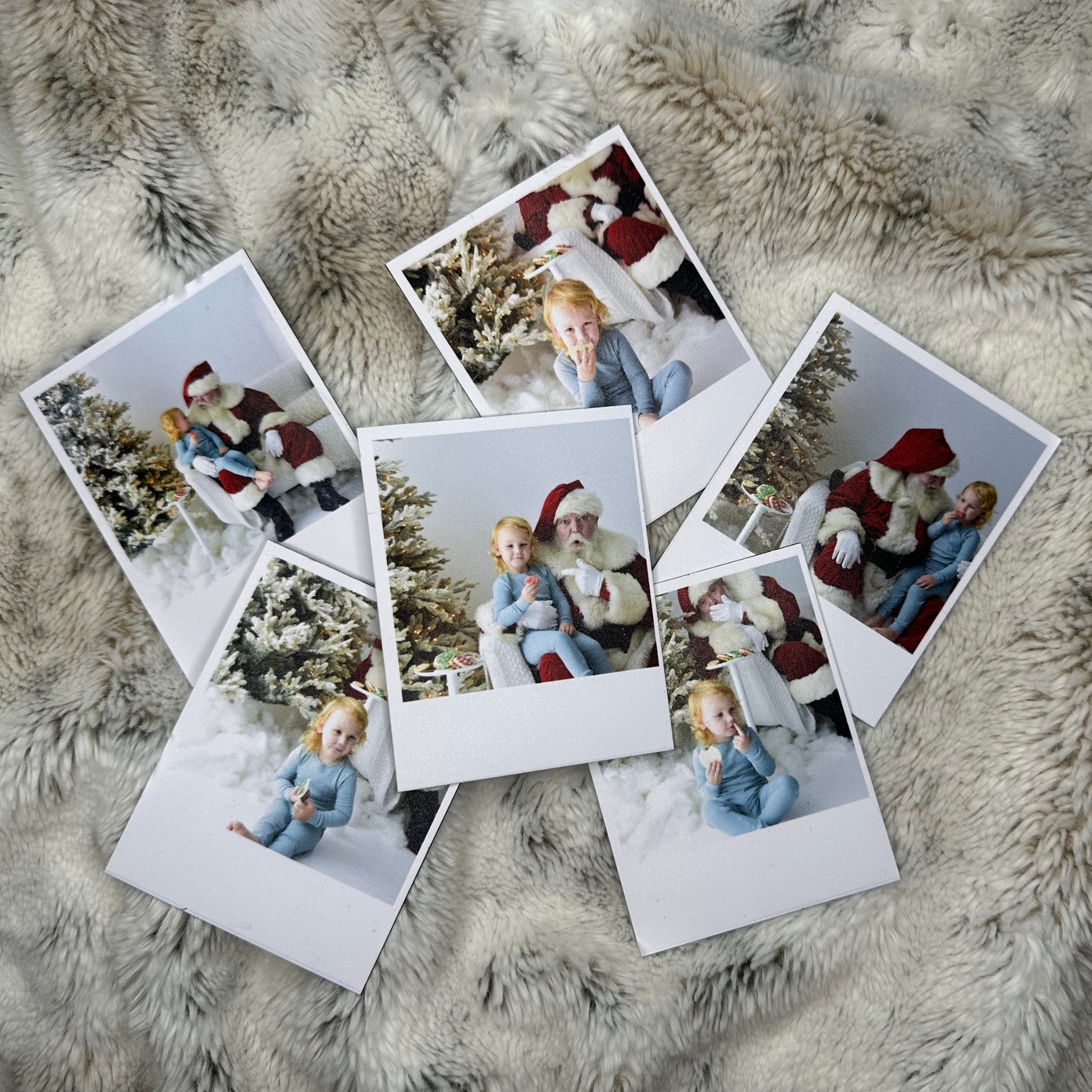 Collection of Polaroid-style Christmas Photo Magnets on a fluffy surface